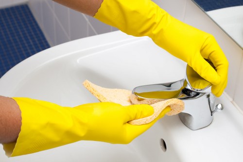 Professional upholstery cleaning equipment on fabric furniture